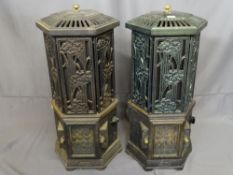 Pair of heavy cast metal electric heaters, 78 cms high E/T