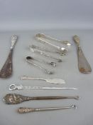 Selection of silver sugar tongs and other items including a skewer/letter opener, various assay