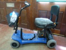 Little Diamond battery powered mobility scooter with manual, charger and cover