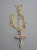 Large nine carat gold crucifix pendant with centre oval blue stone and good link chain, total 9.3