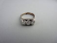 Eighteen carat white gold diamond engagement ring, three stone high band setting, collective