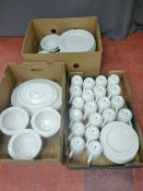 Fifty seven pieces Italian Alessi white porcelain tableware, designed by Ettore Sottsass, 1993