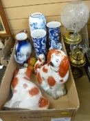 Two vintage brass oil lamps, a pair of Prunus chimney vases (damage), colourful glassware and Staffs