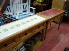 Neat stripped pine Edwardian writing table with tooled red leather top, two drawers and corner