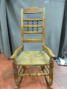 Antique rush seat farmhouse rocking chair, 105 cms high, 51 cms wide