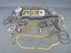 Collection of gold, silver and costume jewellery including a silver charm bracelet with padlock