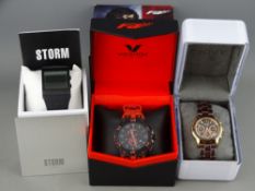 Three boxed designer gent's watches - Storme, DKNY & Viceroy