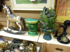 Three modern painted wooden ornaments and a reproduction candlestick phone