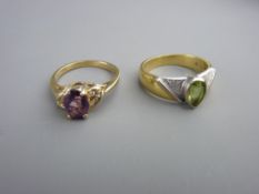Eighteen carat gold dress ring with centre pear shaped peridot and flanking tiny diamonds, 7 grms