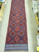 Meshwani carpet runner, rich red ground with repeating diamond block pattern, 270 x 62 cms