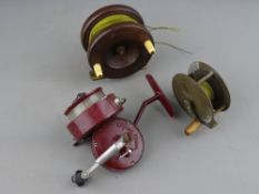 Three vintage fishing reels