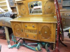 Polished 1930's mirror backed sideboard, the back having twist supporting pillars over a base of two