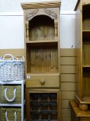 Modern pine kitchen shelving unit with lower wine rack and central drawer