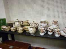 Forty two piece Japanese eggshell porcelain tea service and a twelve place Staffordshire china
