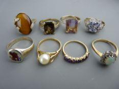 Parcel of eight nine carat gold dress rings, variously decorated, 26.5 grms