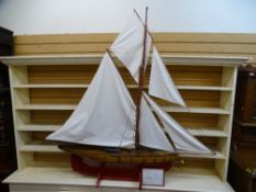 Victorian cutter rig pond yacht, re-furbished in 1984, weighted keel red hull and timber decking