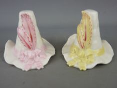 Two Worcester candle snuffers, no. 172 and 178, modelled as lady's feathered hats, ribbon tied,