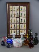 Four glass paperweight ducks, four other glass paperweights, framed military themed cigarette