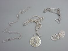 Two silver link chains, 5.3 grms, a yellow metal box link chain and a white metal chain with