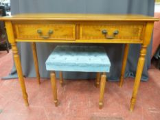 Reproduction crossbanded yew wood two drawer side table on reeded supports, 75.5 cms high, 99 cms