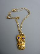 Nine carat gold link necklace with fifteen carat gold owl pendant, 7.2 grms