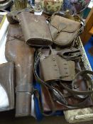 Leather goods to include gun cases, document case and other items along with a cast iron bedroom