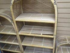 Graduated trio of arched top wicker bookcases