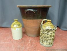 Two stoneware W Jones, Wine & Spirit Merchant flagons and a vintage pottery egg crock