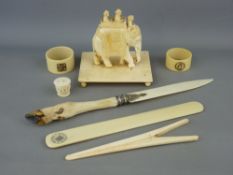 Group of 19th Century ivory and bone products including an Indian elephant with Howdah (top