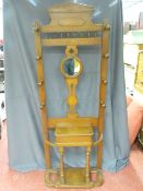 Edwardian mahogany mirrored hallstand with turned wooden coat hooks and lidded glove box, 210 cms