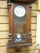 Walnut cased Vienna style pendulum wall clock
