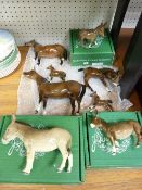 Three boxed Beswick donkey figurines and five unboxed Beswick horses