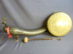 Brass gong and beater and a large Eastern brass peacock ornament