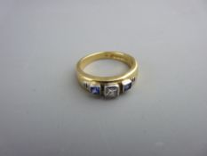 Eighteen carat gold diamond and sapphire dress ring, having a centre square cut diamond with