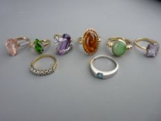 Parcel of eight nine carat gold dress rings, variously decorated, 28 grms total