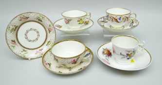 A GROUP OF FOUR SWANSEA PORCELAIN CUPS & SAUCERS comprising (1) a teacup with with scroll loop