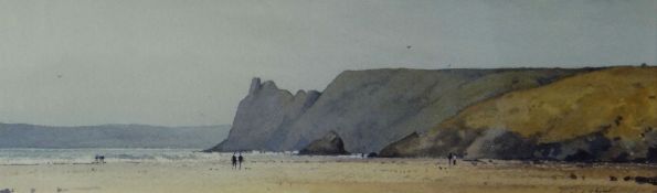 GARETH THOMAS watercolour - Gower beach scene with figures, signed, 11 x 36cms