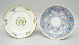 TWO SWANSEA PORCELAIN PLATES the first with moulded border and of lobed form decorated, the border