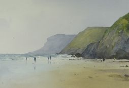 GARETH THOMAS watercolour - figures walking on Gower beach, signed, 27 x 38cms
