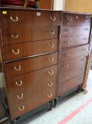 A GOOD PAIR OF MID-CENTURY NARROW CHESTS of seven drawers