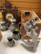 A CARVED FRAMED CLOCK a cased Prior microscope and sundry items of pewter