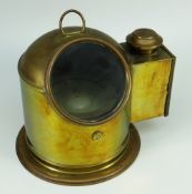 A VINTAGE BRASS ENCASED COMPASS ON GIMBAL