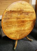 A C19TH ROSEWOOD TILTING BREAKFAST TABLE with brass inlay and on a base composed of twist columns