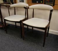 A PAIR OF MID-CENTURY DANISH TUB CHAIRS upholstered with cream leather to seat and back, both chairs