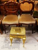 A GOOD C19TH PIERCED BRASS FOOTMAN together with a pair of balloon back dining chairs