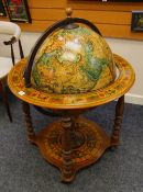 A LATE C20TH REPRODUCTION TERRESTRIAL GLOBE COCKTAIL CABINET