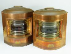 A PAIR OF AHLEMANN SCHLATTER of BREMEN SHIP'S LAMPS of curved copper form 36cms high