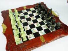 A MID TO LATE 20TH CHESS SET in the Chinese taste