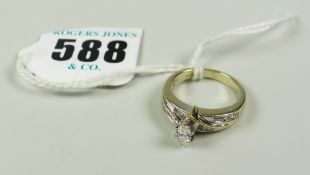 14 CARAT WHITE GOLD DIAMOND DRESS RING having central marquise cut diamond approximately 0.2 carat