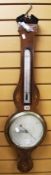 AN ANTIQUE MAHOGANY BAROMETER/THERMOMETER with string decoration to the edge and inlaid decoration